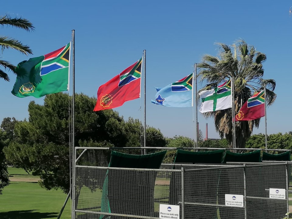 SANDF service flags flying at the driving range — SA Army, SA Air Force, SA Navy, SA Medical Services