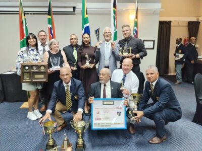 Group photo of award winners holding and displaying their trophies at the Defence (WP) Golf Club Awards Event 2025.