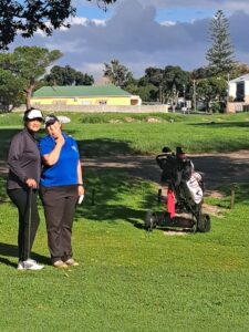Lady golfers on the lush fairway at Rondebosch Golf Club