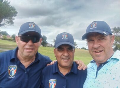 Three smiling golfers posing together at Bellville Golf Course