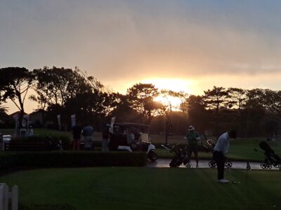 Sunrise over Royal Cape Golf Club with golfers and carts silhouetted against the early morning sky, LIV 3, April 2026.
